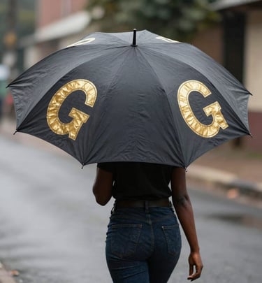 A collection of Aurumvibe candles glowing warmly on a modern black shelf with gold trim.