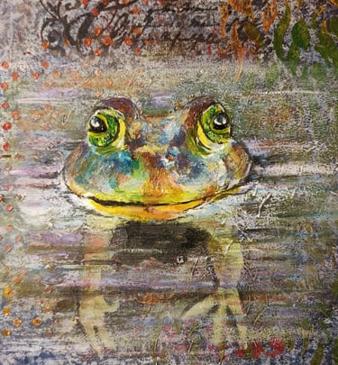 Textured mixed media painting of a colorful bullfrog with large green eyes peering out of water.