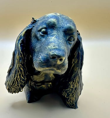 Metallic blue and gold 3D-printed Cocker Spaniel dog statue, showcasing intricate texture and artistic design for home decor.