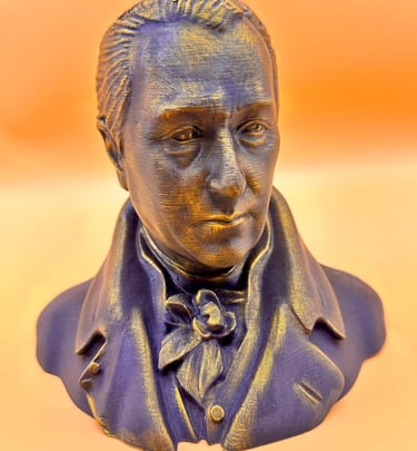 A 3D printed bust of a historical figure with a bronze and purple metallic finish on an orange background.