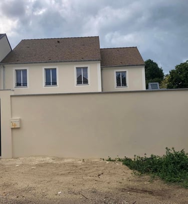 a house with a trash canister and a trash canister