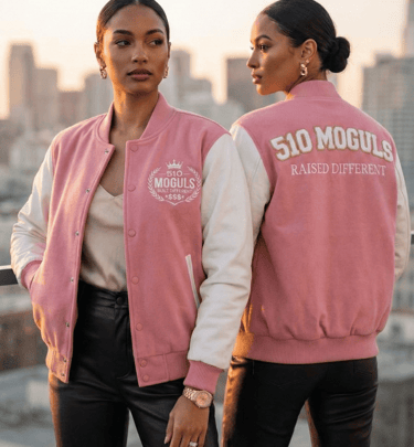 two women in pink jackets and black pants