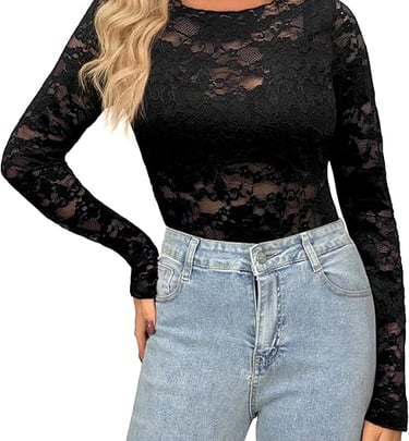 Woman wearing a black long sleeve floral lace bodysuit paired with light wash high-waisted jeans.