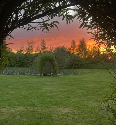 Arches by the pond at sunset
