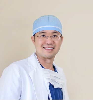 a man in a white lab coat and a blue hat