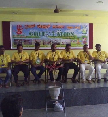a group of people sitting on a stage
