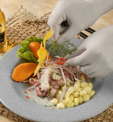 the preparation of a dish of ceviche seafood in Lima Ceviche Bar Restaurant in Lisbon, Portugal