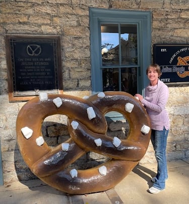 Hannah (Next Vacation Tours & Travel) at Julius Sturgis Pretzel Bakery in Lititz, Pennsylvania