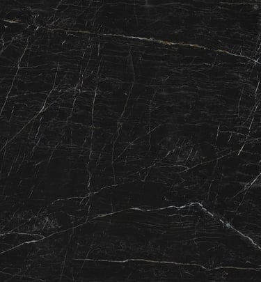Dekton Somnia features a light creamy background with subtle brown veins, offering a timeless classi