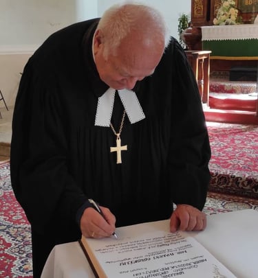 Signing his membership documents
