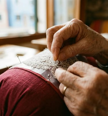 Elderly artisan hands stitching traditional Burano needle lace in natural window light