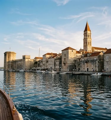 Trogir UNESCO old town and cathedral tower seen from the Magnific Raptor boat tour