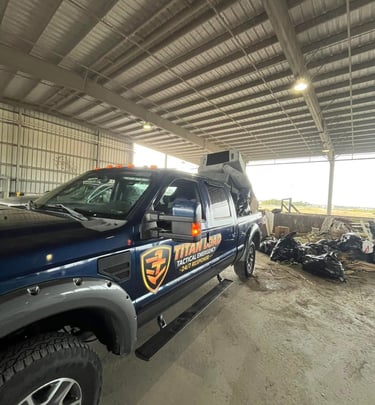 Titan Load junk removal truck unloading debris at dump site in Pinellas County Florida