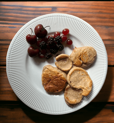 mini oats pancakes with cherry, blackberry and grapes