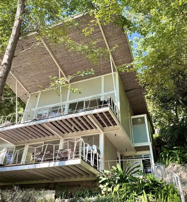 a house with a balcony and a balcony