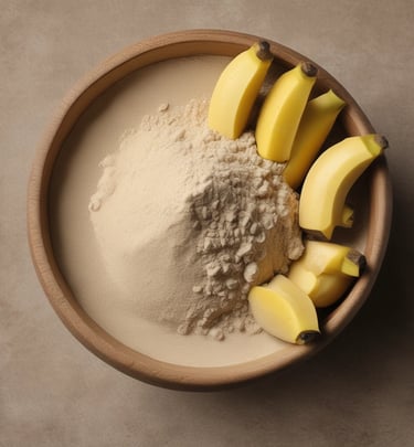 Close-up of bright yellow banana powder spilling from a rustic wooden spoon onto a textured surface