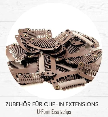 A pile of brown U-form replacement clips for clip-in hair extensions on a white background.