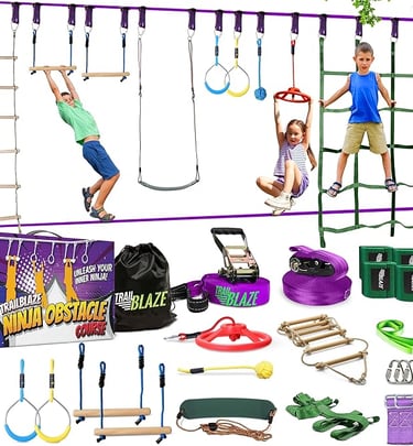 Kids playing on an outdoor ninja obstacle course kit with monkey bars and climbing net.