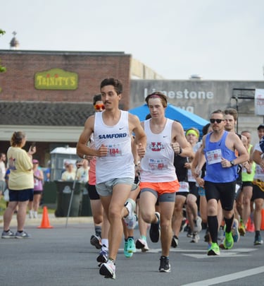 Runners Sprint Away from the starting line of the Athens Alabama Chick Fil A 10K Race