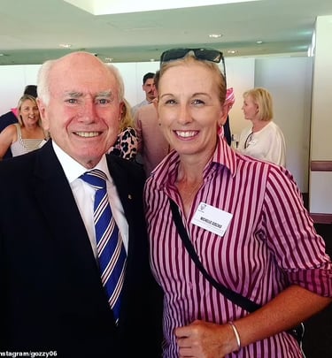 Michelle Goszko with the Australian Prime Minister John Howard