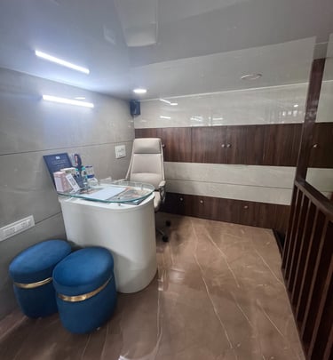 Dr Seema Sheen Aesthetics reception area with a reception table and stools