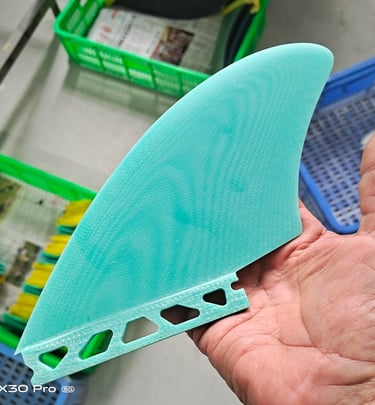 a person holding a piece of plastic material