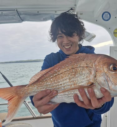 A happy customer with his first snapper