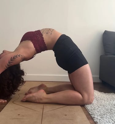 Woman practicing yoga on mat