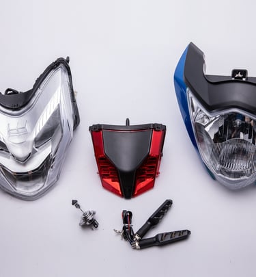 Motorcycle lighting kit including headlamp assemblies, red LED tail light, and turn signal indicators.