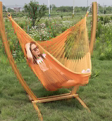 Orange hammock chair and wooden stand