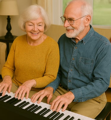 A smiling senior couple enjoying a piano lesson together on a keyboard at home.