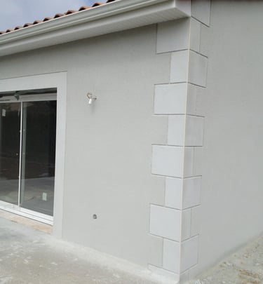 a house with a large window and a patio with a patio