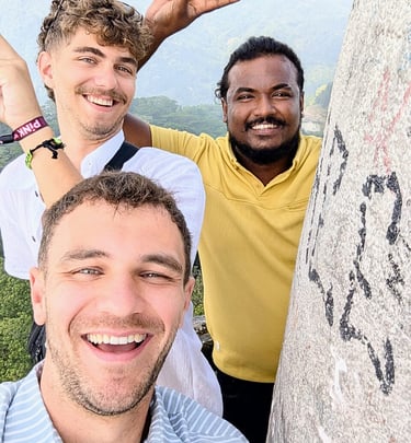 Two tourists traveling with a professional driver during an island-wide private tour in Sri Lanka.
