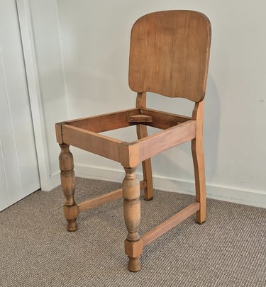 Vintage wooden dining chair frame with turned legs and a solid backrest paint stripped by laser