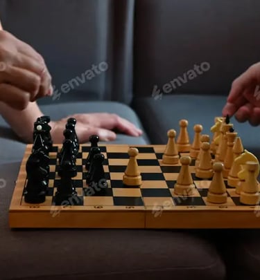 a man and woman playing chess in a living room