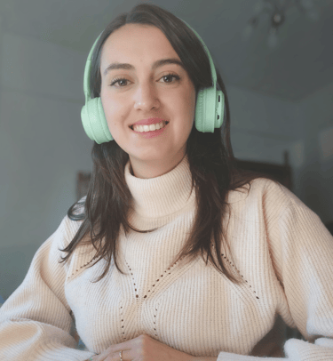 Profile picture at desk with headphones