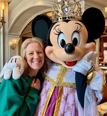 Leslie Hammer pictured with Minnie Mouse at Disneyland® Paris.
