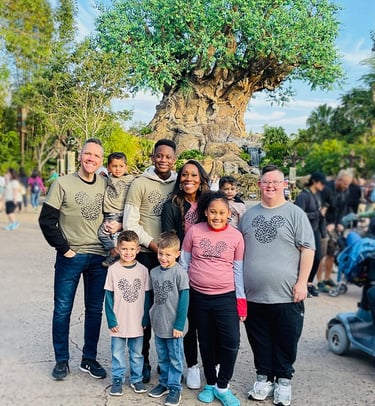 Shani Roberts pictured with her family at Disney's Animal Kingdom® Park, at Walt Disney World®.