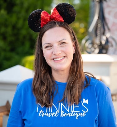 Kate Elliott pictured at Disney's Magic Kingdom® Park.