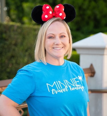 Amy Haskell pictured at Disney's Magic Kingdom® Park.