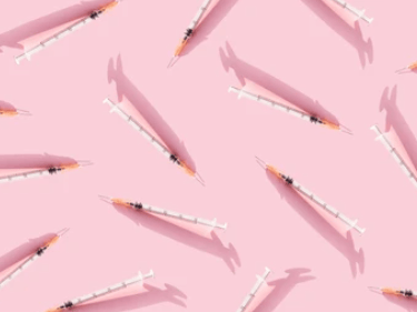 sitinges on pink background