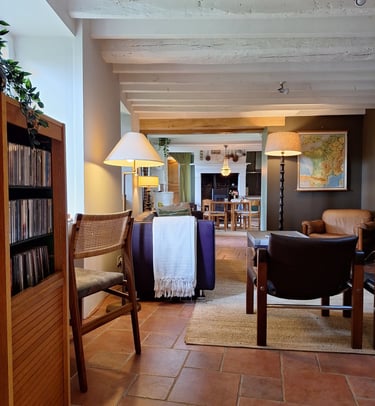 De woonkamer van ons huis.