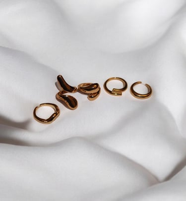 Choice of rings in golden designs to match your outfit. 