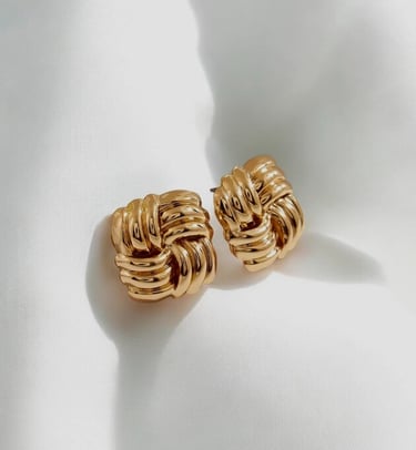 Shop choice of different styles of earring to match your outfit. 
