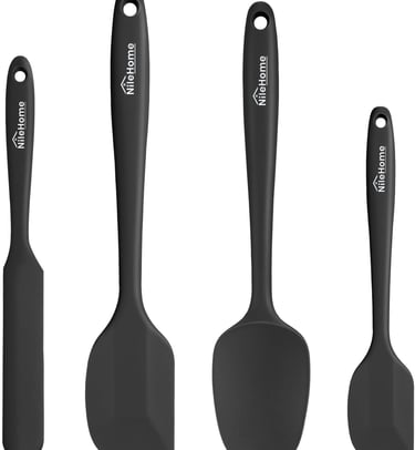 a set of three spatulables with a black and white spatulable
