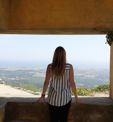 Martina on top of a mountain in Cascais.