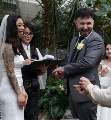 Wedding couple laughing at Bloedel Conservatory in Vancouver,BC
