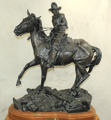 Large, Western bronze by artist Ken Payne.