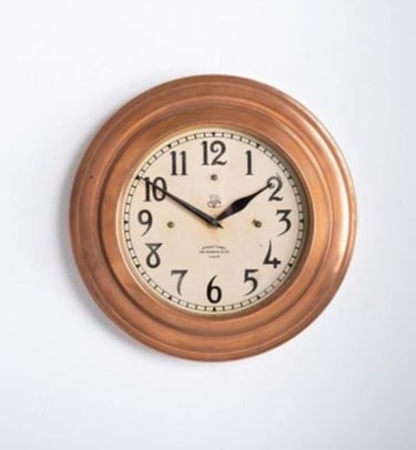 a clock on a wall with a clock on it