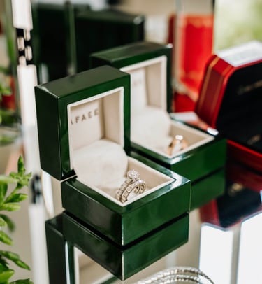 Close-up of wedding rings in boxes